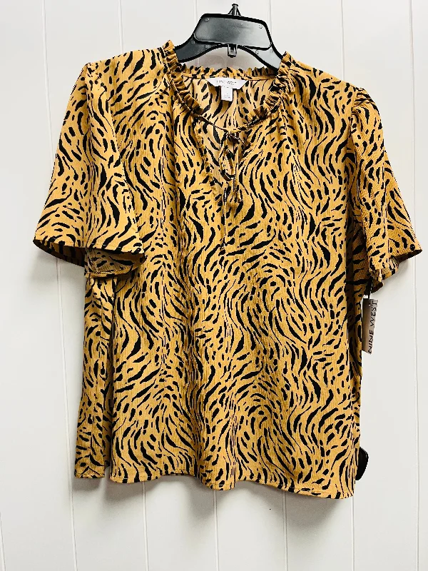 women's tops with lace-up frontsTop Short Sleeve By Nine West Apparel In Animal Print, Size: L